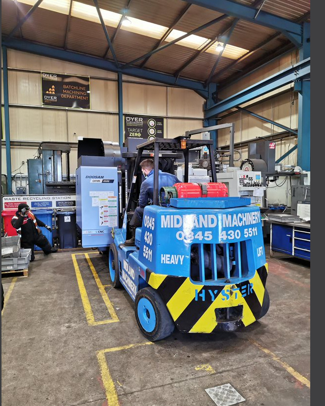 New state-of-the-art CNC machine being unloaded at dyer engineering